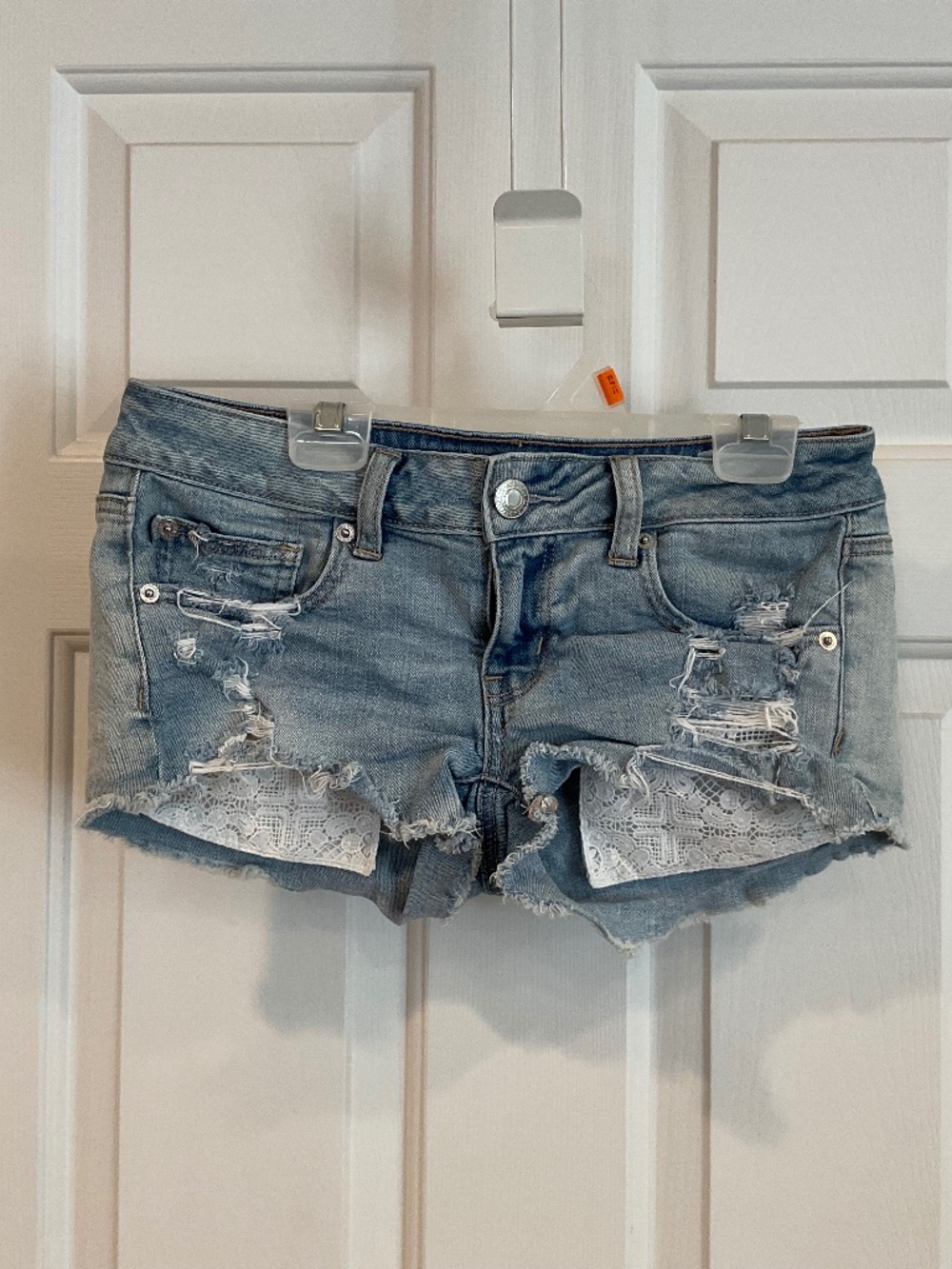 American Eagle Light Blue wash Distressed Denim Shorts with White Lace Size 2